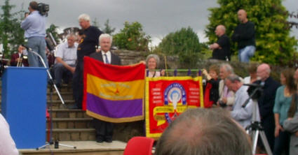 IBMT and Connolly Column banners in the graveyard.